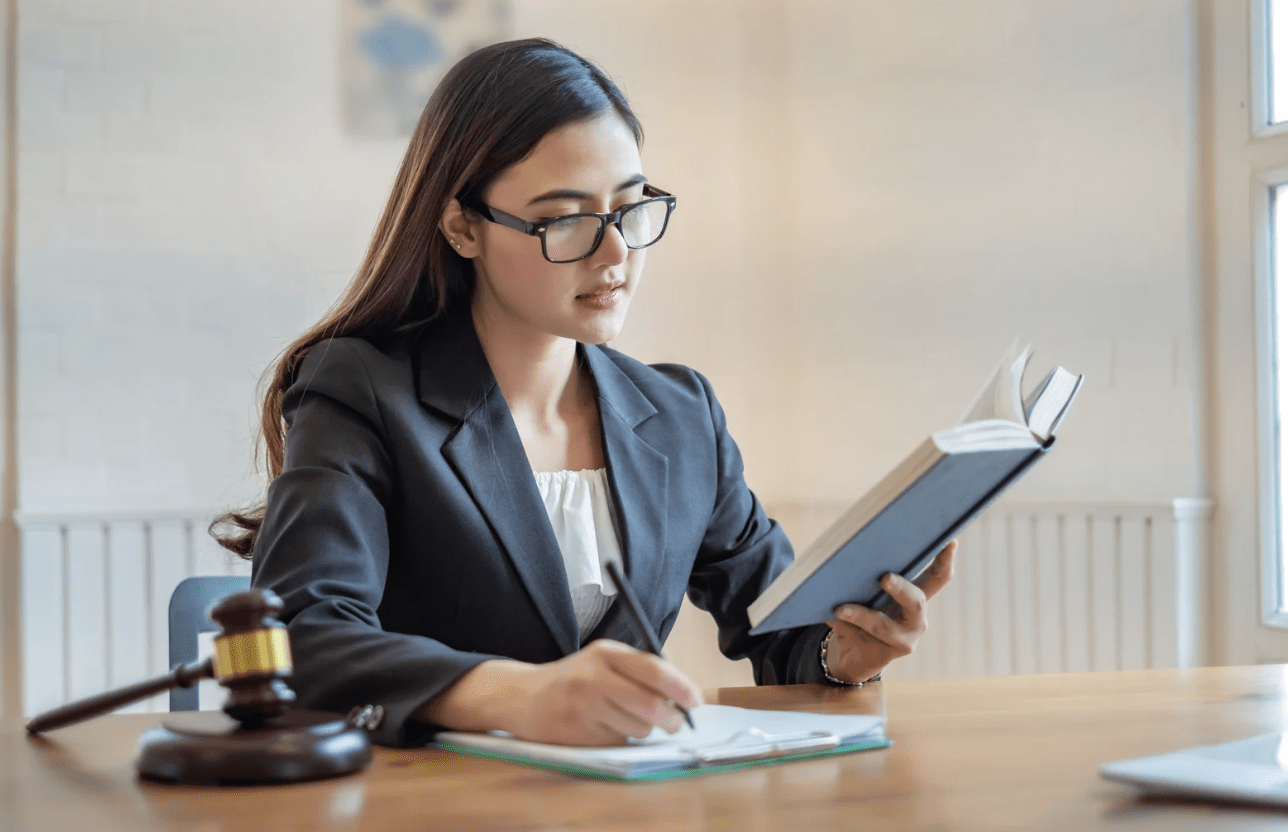 A lady attorney is studying a tax problem