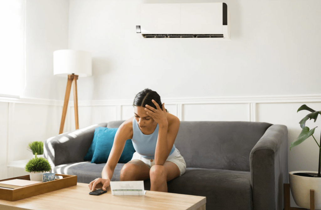 A women is watching at AC repairing quotation paper