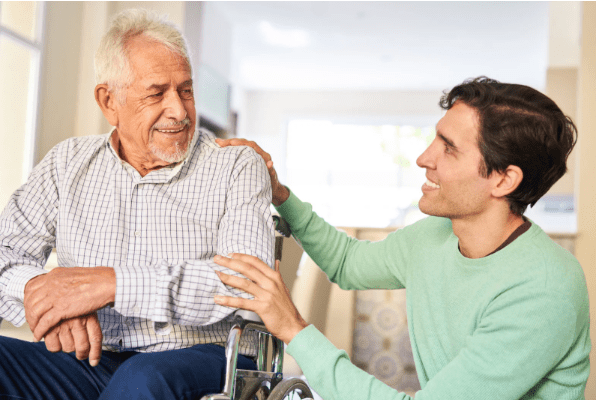 Family caregiver taking a planned break while an older adult receives support at home.